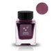 Square glass bottle of Sakura Moonlight fountain pen ink, 30ml, by Tono & Lims, featuring a dusky pinkish-purple shade with a black screw-on cap.