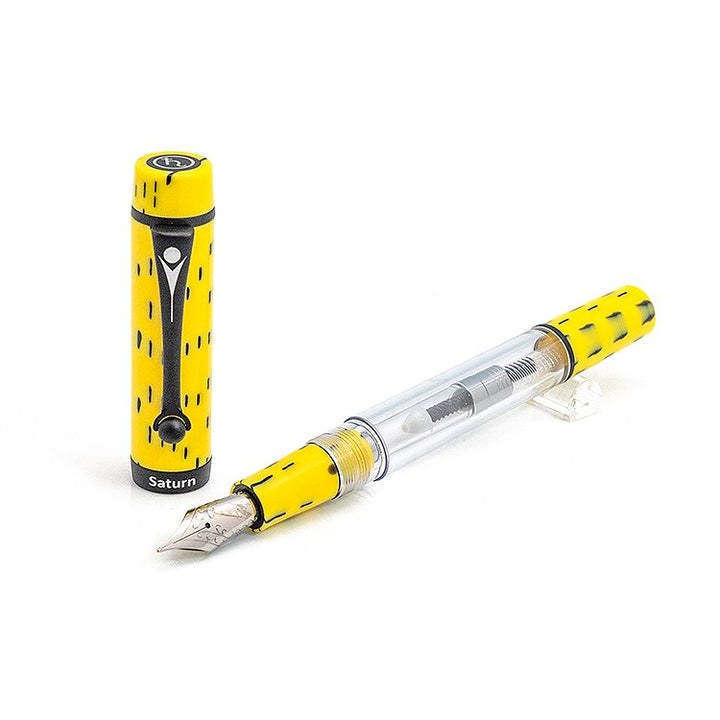 Planet Series (Saturn) - Fine fountain pen disassembled: yellow cap with “Saturn” label, clear reservoir barrel, and stainless-steel nib, showcasing versatile writing functionality.