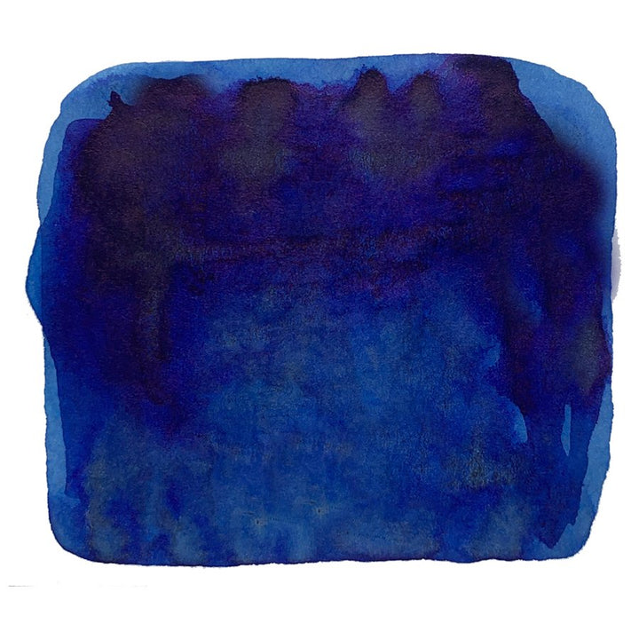 Abstract swatch of deep blue watercolor, representing Seiboku - 50ml Nano Pigment Ink. Rich, dark top gradient fades to lighter blue, showcasing ink's water-resistant quality.