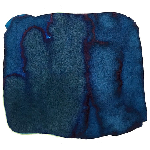 Squeteague - 2ml ink swatch showing a blue-green hue with varied tones, darker edges, and subtle purplish veins, highlighting its unique shading characteristics.