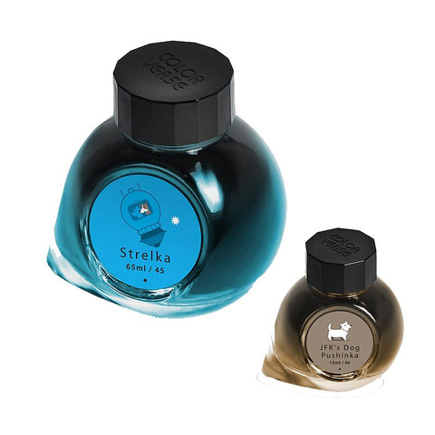 Strelka & JFK's Dog Pushinka - 65ml + 15ml Set featuring two Colorverse ink bottles, a brochure, pen rest, stickers, bookmark, and branded napkin in the box.