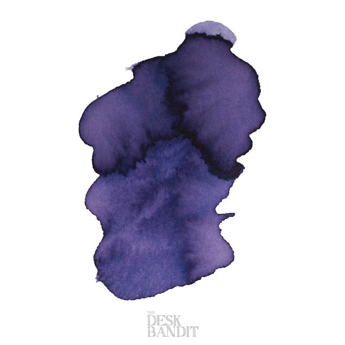 Robert Oster Summer Storm - 2ml ink sample, featuring a deep purple ink blot on a white background with a faint THE DESK BANDIT watermark.