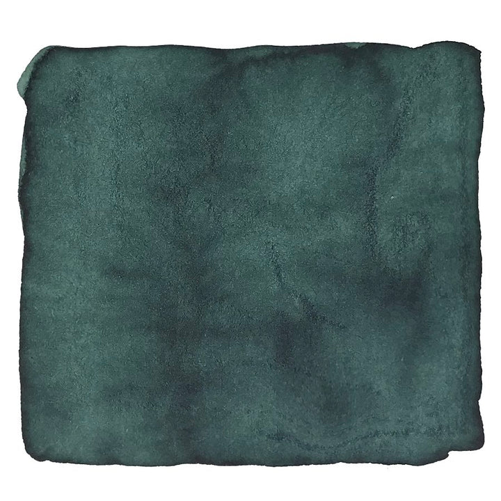 Folded dark-green microfiber cloth alongside Able and Miss Baker 2ml ink set, highlighting the Colorverse plant-based dye offering a smooth writing experience.