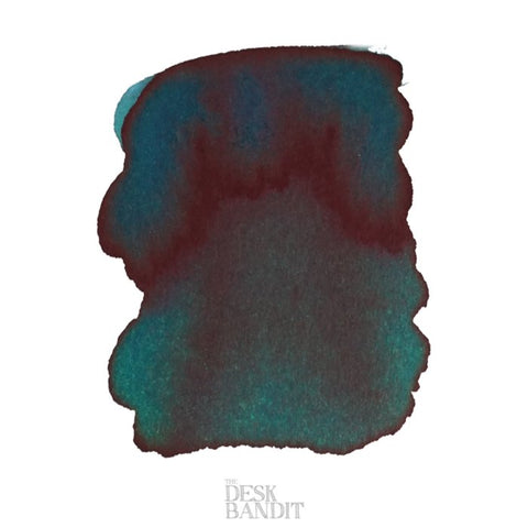 Iroshizuku Ink - Syo-Ro (2ml) sample shows a deep teal with a maroon sheen, highlighting its shading and sheening properties on white paper.