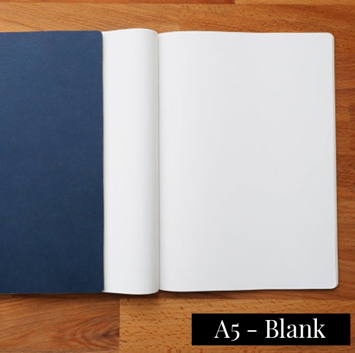 Tomoe River Insert - A5 Blank, features an open notebook with a dark blue cover and blank pages, ideal for versatile writing and lightweight portability.