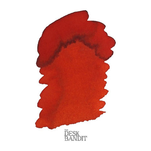 Terracotta - 2ml ink sample by Robert Oster, showcased as a bright reddish-orange abstract swatch on a white background, featuring The Desk Bandit watermark.