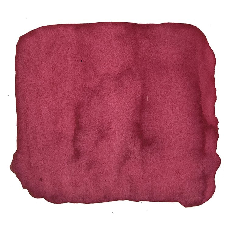 Tokyo Gift - 2ml ink swatch displays a textured burgundy watercolor effect, representing Noodler's Ink's dye-based versatility for various writing needs.