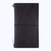 Leather Cover (Black) with elastic closure, features a soft leather exterior, elastic slots for inserts, and a metal charm, ideal for versatile journaling.