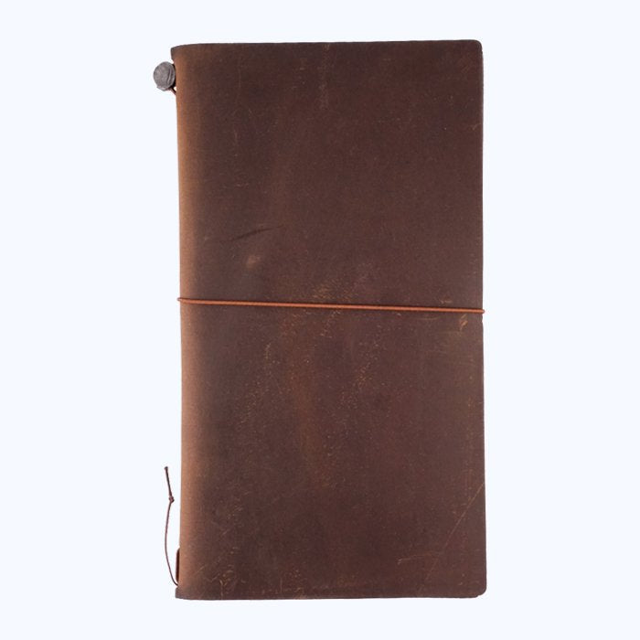 Leather Cover (Brown) featuring a slim, weathered design with wrap-around elastic closure, includes a blank notebook, spare elastic, and cotton pouch. Hand-made in Chiangmai.