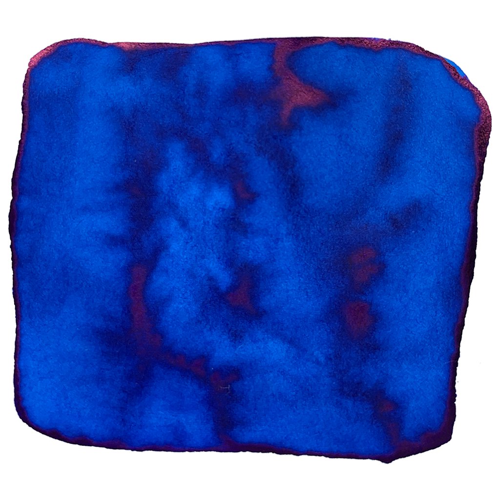 True Blue - 50ml ink swatch showing a vibrant cobalt-to-royal blue wash with deeper pigment veins and a reddish-purple sheen along the edges.