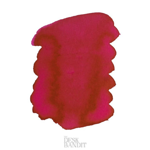 Iroshizuku Ink - Tsutsuji (2ml) swatch, deep pink-red hue on white with “THE DESK BANDIT” watermark, showcasing Pilot's azalea-inspired ink sample.