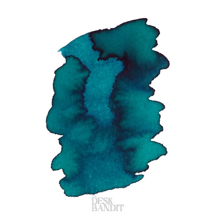 Turquoise - 2ml ink sample by Robert Oster, featuring a blue-green watercolor swatch with gradient and feathering on a white background, watermark THE DESK BANDIT visible.