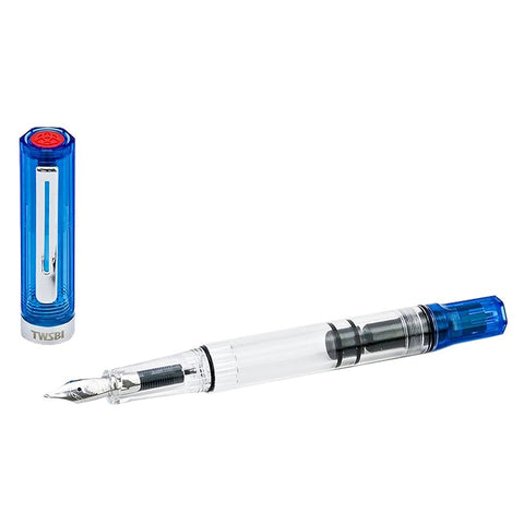 ECO (Transparent Blue) - Fine fountain pen with a clear barrel showing the piston mechanism and stainless-steel nib; blue cap with TWSBI logo beside it.