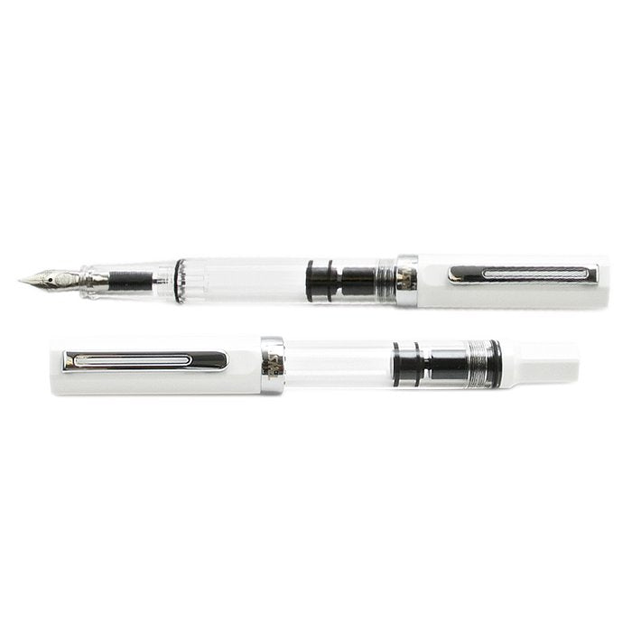 ECO (White) - Medium fountain pen features a clear barrel, visible piston-fill system, white cap, silver trim, and medium nib. Ideal for ink level monitoring.