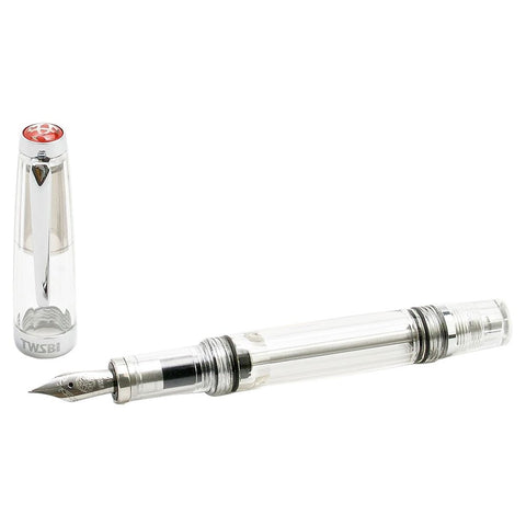 VAC Mini (Clear) - Fine, a transparent TWSBI fountain pen with visible piston-filling mechanism and stainless steel nib, alongside its clear screw-on cap.