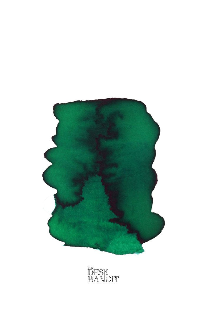 Swatch of Verdura (2ml) green ink by Rohrer & Klingner, showcasing varying saturation on white paper, with THE DESK BANDIT logo visible.