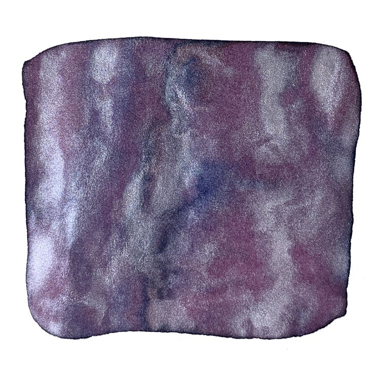Violet Clouds (Shake 'N' Shimmy) ink swatch shows dusky purple with blue and red tones, enhanced by a silvery shimmer, reflecting its vibrant, sustainable essence.