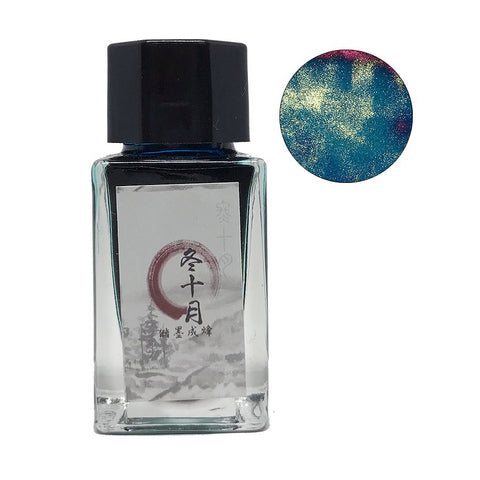 Winter October - 18ml ink: Square glass bottle with black cap, featuring Chinese label; teal-blue ink swatch with gold sparkle and reddish sheen displayed alongside.
