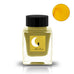 Tono & Lims With Moon 30ml fountain pen ink in a square glass jar with cat-themed label, displaying its unique mustard-yellow hue.