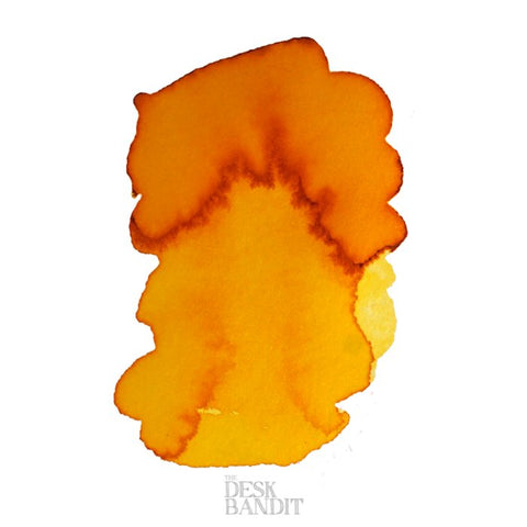 Yellow Sunrise - 2ml ink sample by Robert Oster, featuring an abstract orange-yellow watercolor swatch on a white background with a THE DESK BANDIT watermark.