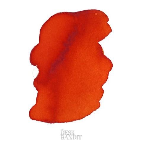 Iroshizuku Ink - Yu-Yake (2ml) features a bright orange-red abstract ink swatch with subtle shading on a white background, from The Desk Bandit review site.