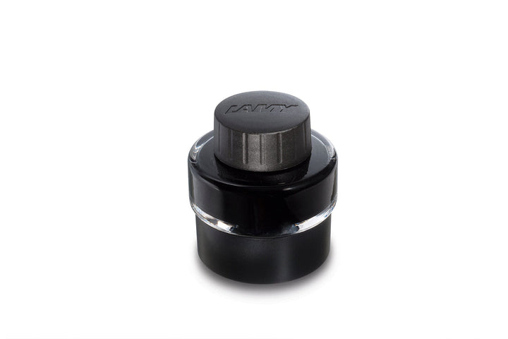 Lamy 2000 - Broad fountain pen ink bottle, featuring a cylindrical glass jar with black ink and a black cap embossed with the Lamy logo.